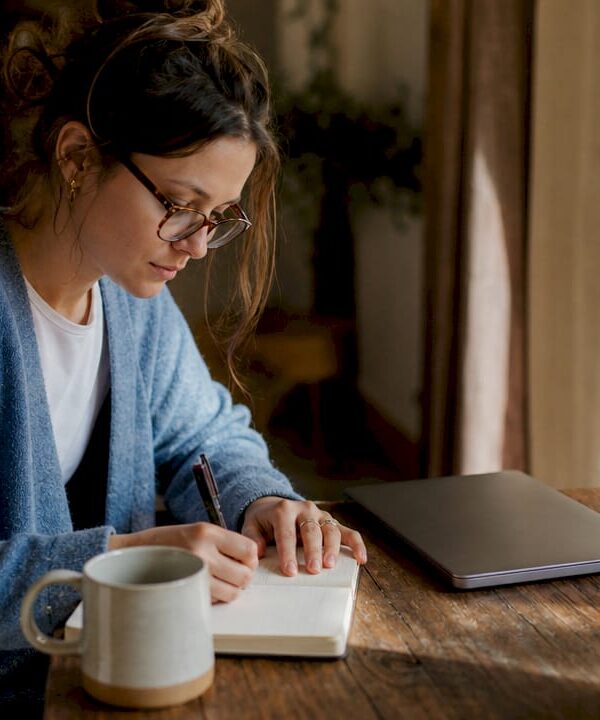 Solo entrepreneur working at home office desk