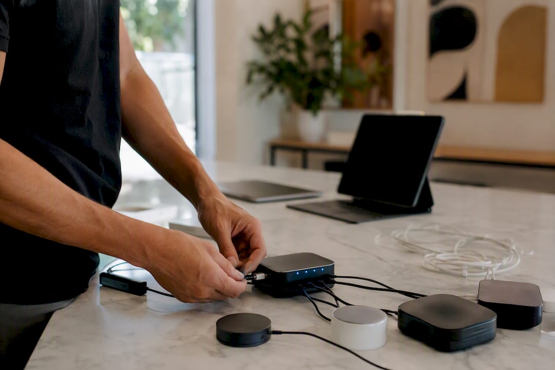 Hands wiring automation device on desk
